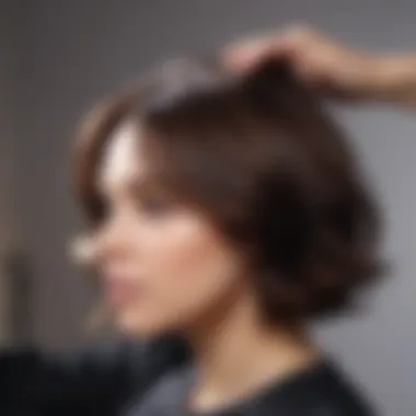 A professional applying a nourishing hair treatment before colouring