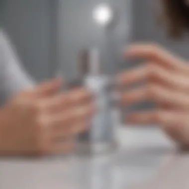 A professional stylist applying Essie Silver Nail Polish in a chic salon.