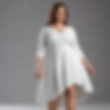 Stylish white plus-size dress with asymmetrical hemline