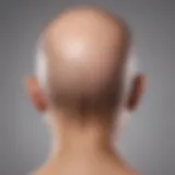 A person examining their scalp for signs of hair loss