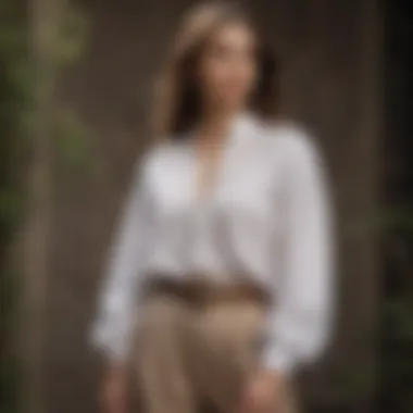 Flowy white cotton blouse styled with statement accessories