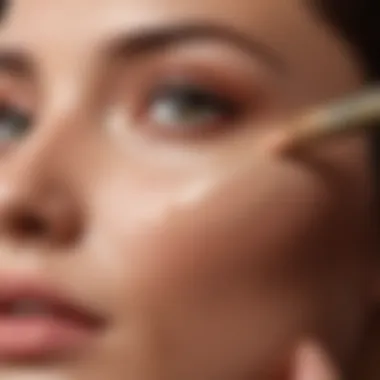 Close-up of a hand applying foundation to achieve a flawless finish.