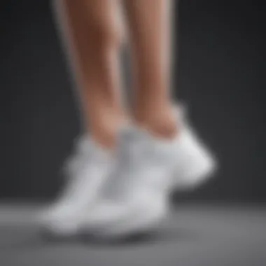 White tennis shoe featuring innovative arch support design