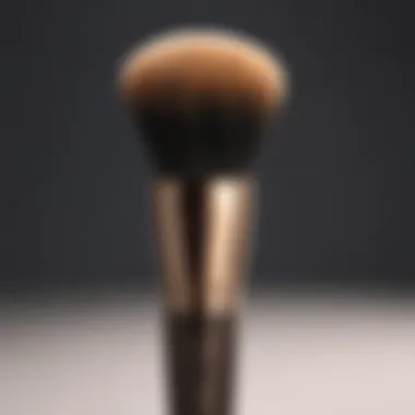 Bronzer brush handle with intricate design