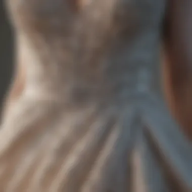 Close-up of fabric detailing on a petite evening gown emphasizing quality craftsmanship