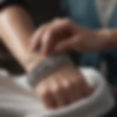 Silver bracelet being polished with a cloth