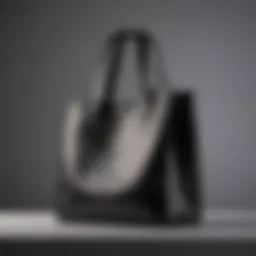The Telfar Medium Black Shopping Bag displayed on a minimalist backdrop showcasing its elegant silhouette.