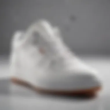 White suede shoe protected with water-repellent spray